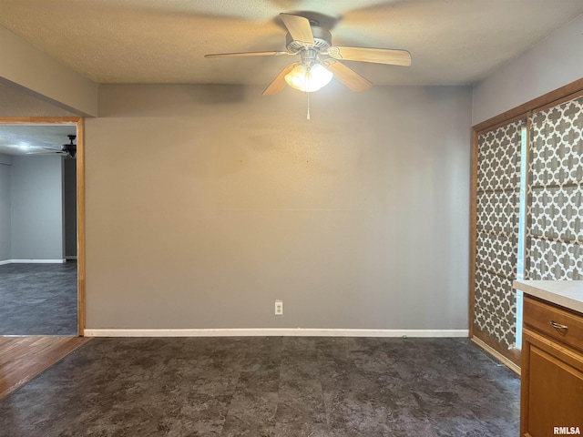 2000 W Gray Dr, Carbondale, IL 62901 - empty room featuring baseboards and ceiling fan