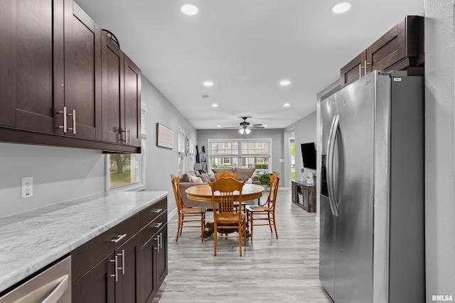 dining area with ceiling fan, light wood-type flooring, and recessed lighting