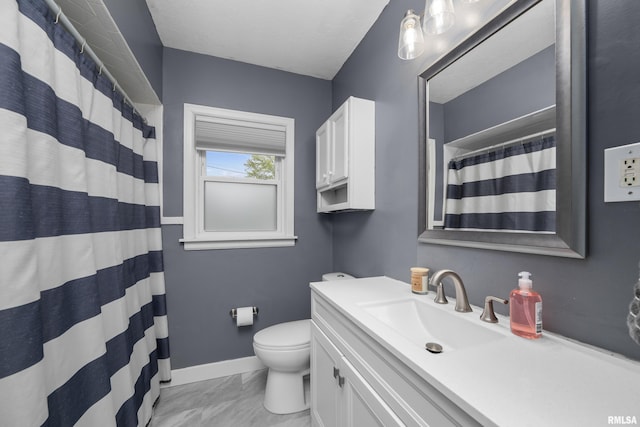 full bath with vanity, baseboards, toilet, marble finish floor, and a shower with shower curtain