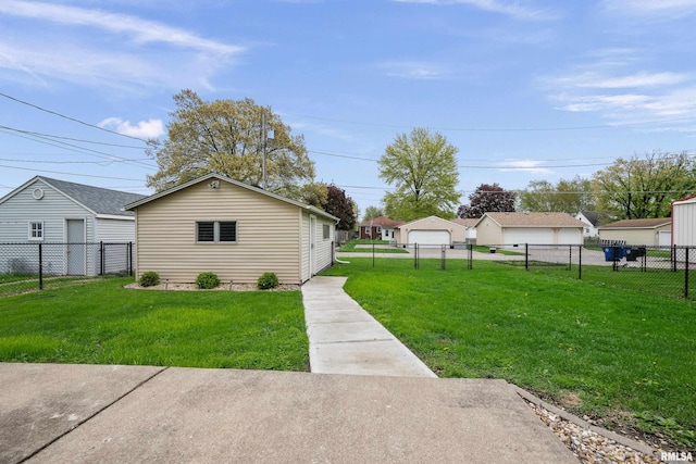 exterior space featuring a garage and a fenced backyard
