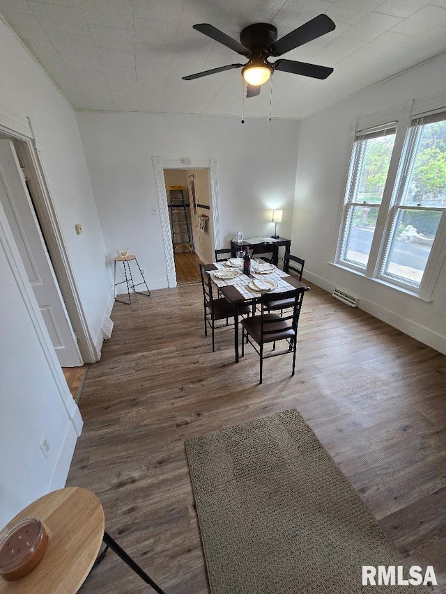 818 16th Ave, Fulton, IL 61252 - dining space with baseboards, a ceiling fan, wood finished floors, and visible vents