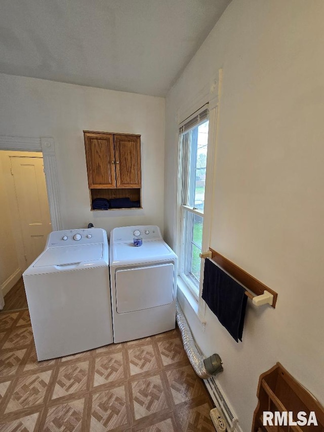 818 16th Ave, Fulton, IL 61252 - laundry area with independent washer and dryer, plenty of natural light, and cabinet space