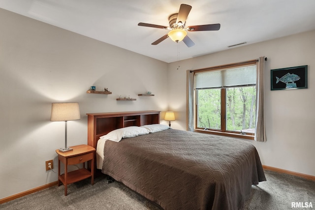 bedroom with carpet floors, baseboards, ceiling fan, and visible vents