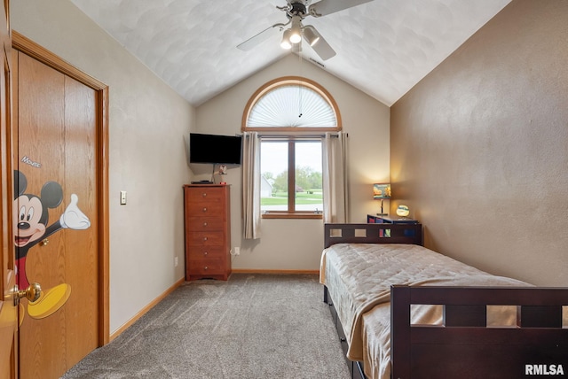 bedroom with carpet floors, baseboards, ceiling fan, and vaulted ceiling