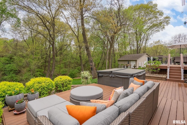 wooden deck featuring an outbuilding, a hot tub, and outdoor lounge area