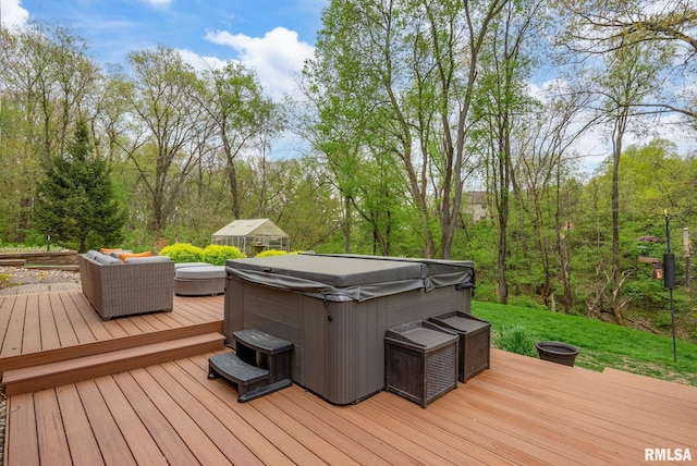 wooden terrace with a hot tub
