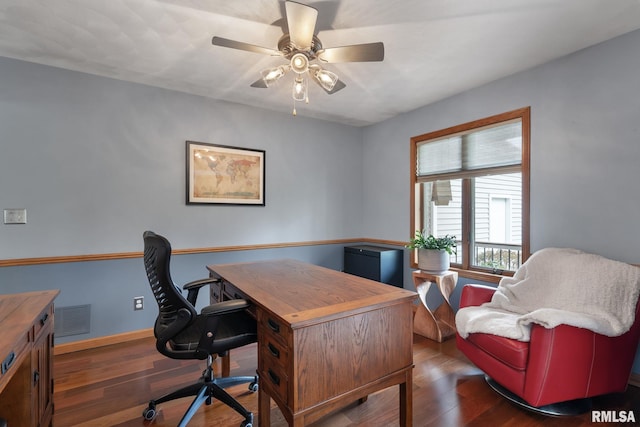 office area featuring baseboards, ceiling fan, wood finished floors, and visible vents