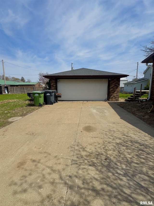 view of home's exterior with an outbuilding and a garage