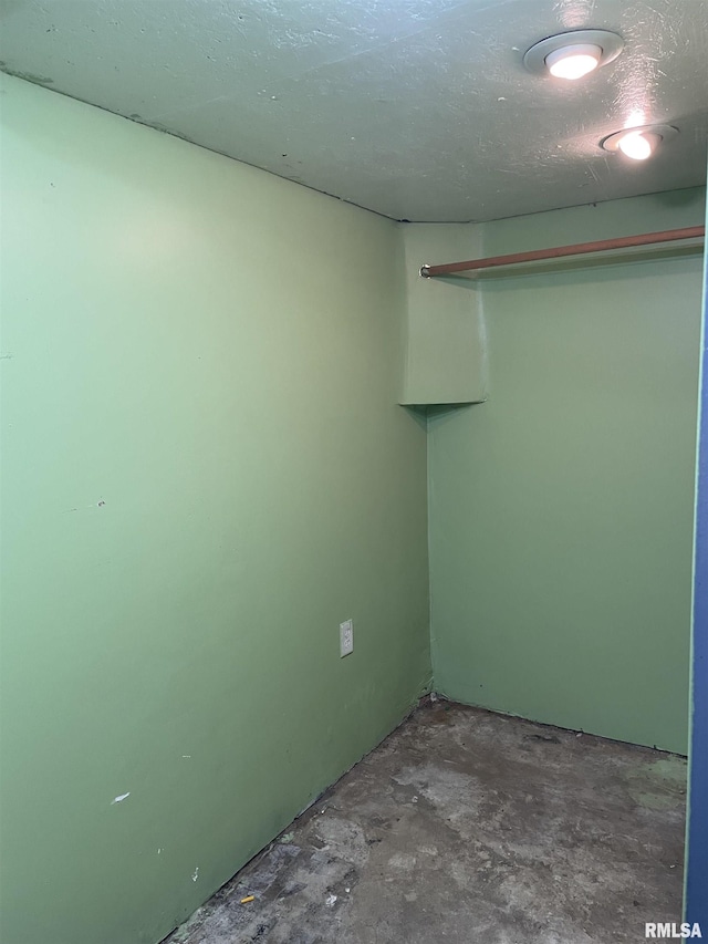 interior space with unfinished concrete floors