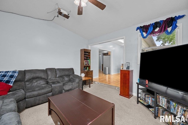 2303 Pinehurst St, Bettendorf, IA 52722 - living room with light colored carpet, a ceiling fan, and lofted ceiling