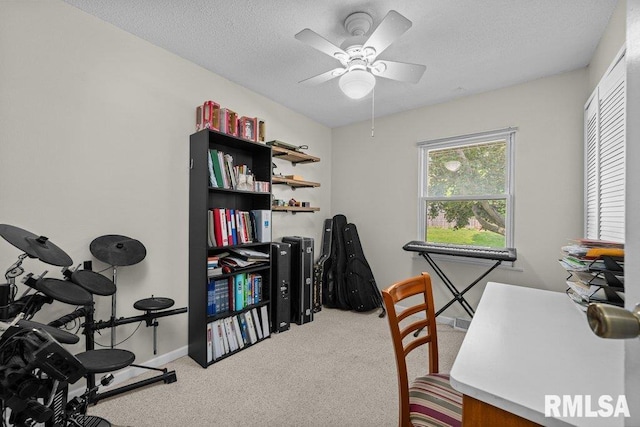 2303 Pinehurst St, Bettendorf, IA 52722 - carpeted office with a ceiling fan, a textured ceiling, and baseboards