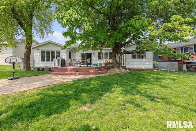 2303 Pinehurst St, Bettendorf, IA 52722 - rear view of property with a patio