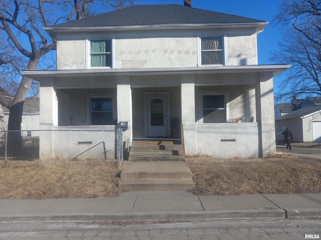 traditional-style home with central air condition unit, stucco siding, covered porch, and fence