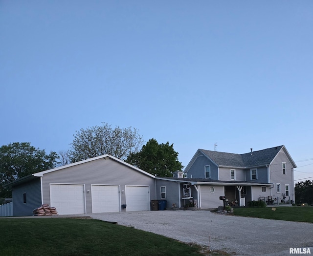 717 NE 2nd St, Galva, IL 61434 - view of front of home with a garage and a front yard