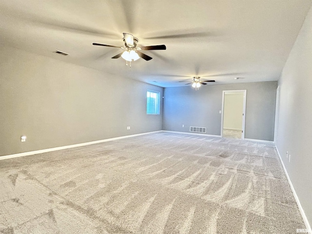 1609 Parkview Ln, Davenport, IA 52807 - unfurnished room with a ceiling fan, light carpet, and baseboards