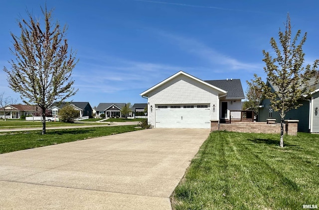 craftsman house featuring driveway, a residential view, a front lawn, and an attached garage
