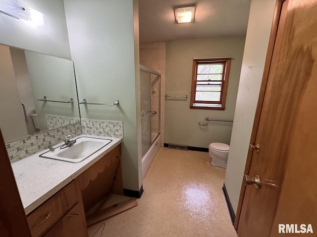 4528 5th St Unit B, East Moline, IL 61244 - full bath with toilet, vanity, and baseboards