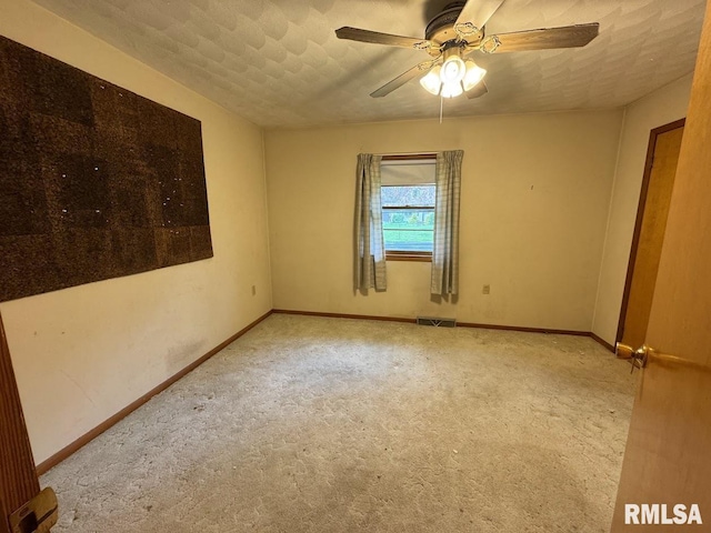 4528 5th St Unit B, East Moline, IL 61244 - carpeted spare room featuring a ceiling fan and baseboards