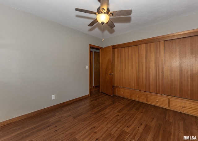 3418 25th St, Rock Island, IL 61201 - empty room with dark wood-style floors, baseboards, and ceiling fan