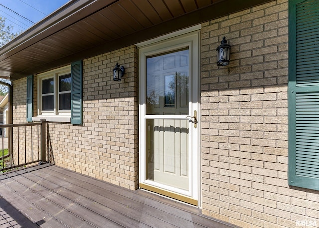 3418 25th St, Rock Island, IL 61201 - doorway to property featuring brick siding