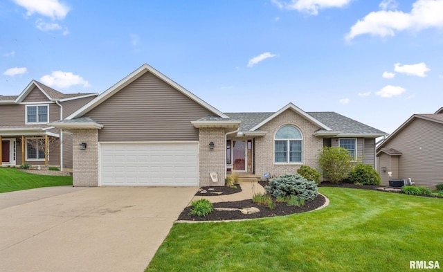 view of front of home with brick siding, driveway, a garage, a front yard, and cooling unit