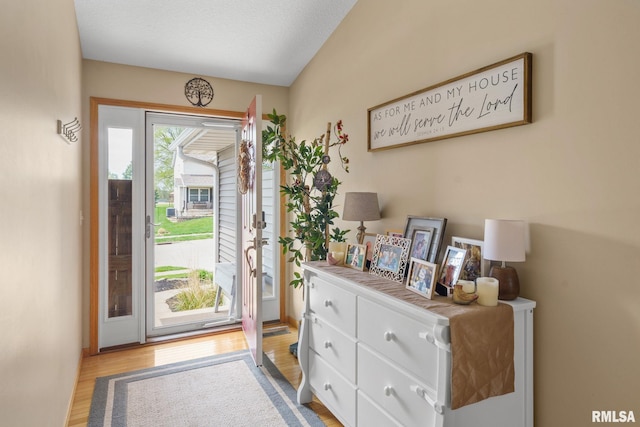foyer with light wood-type flooring