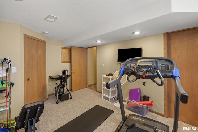 workout area featuring recessed lighting, visible vents, baseboards, and carpet floors