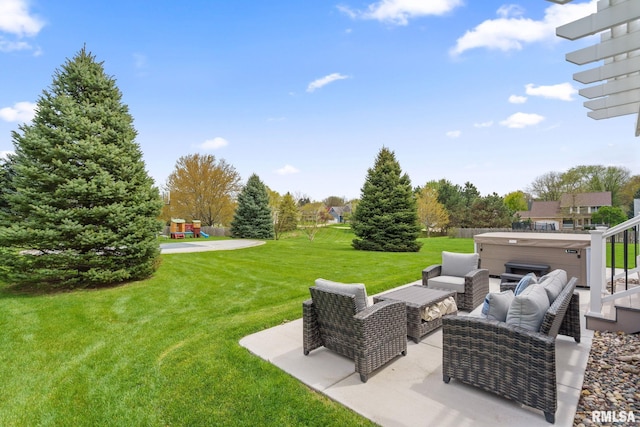 view of yard with a hot tub, a patio area, and an outdoor hangout area