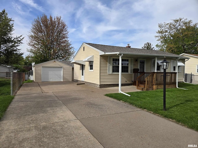 view of front of property with a garage, fence, concrete driveway, an outdoor structure, and a front yard