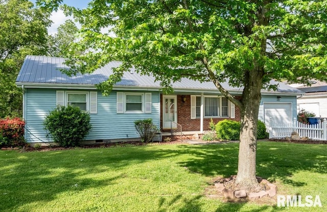 single story home featuring a front yard, metal roof, and a garage