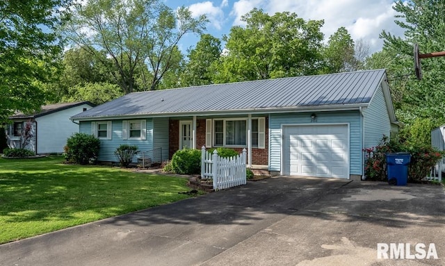 ranch-style house with a front lawn, a porch, metal roof, and a garage