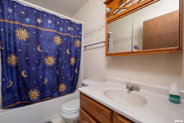 bathroom featuring toilet, vanity, and shower / bathtub combination with curtain