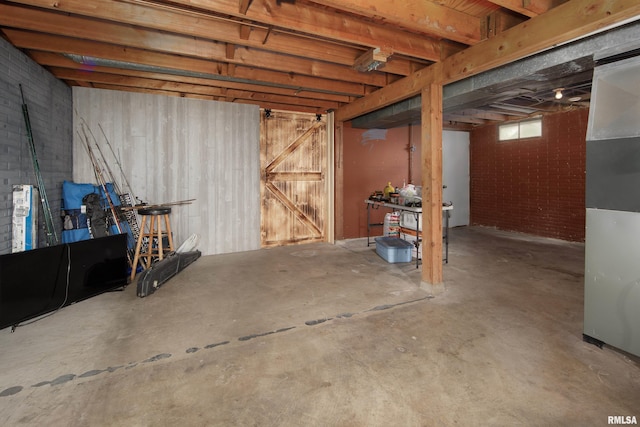 below grade area with brick wall