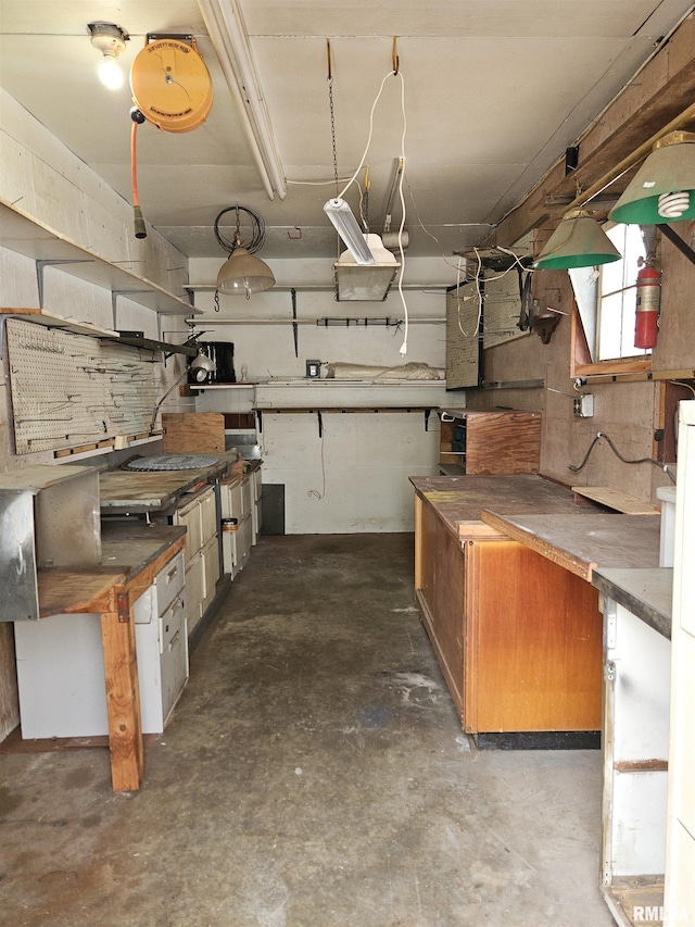 basement with a workshop area