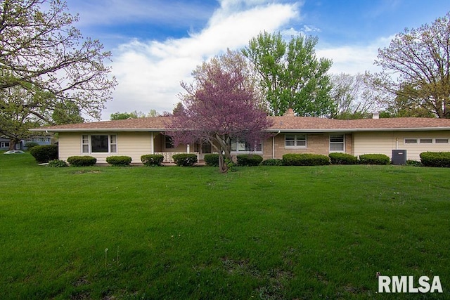 single story home featuring central AC unit and a front lawn
