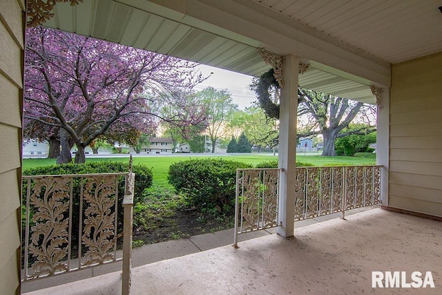 view of patio featuring a porch