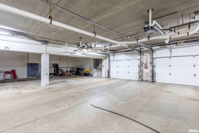 1360 Kimberly Ridge Rd Unit 309, Bettendorf, IA 52722 - garage with a garage door opener