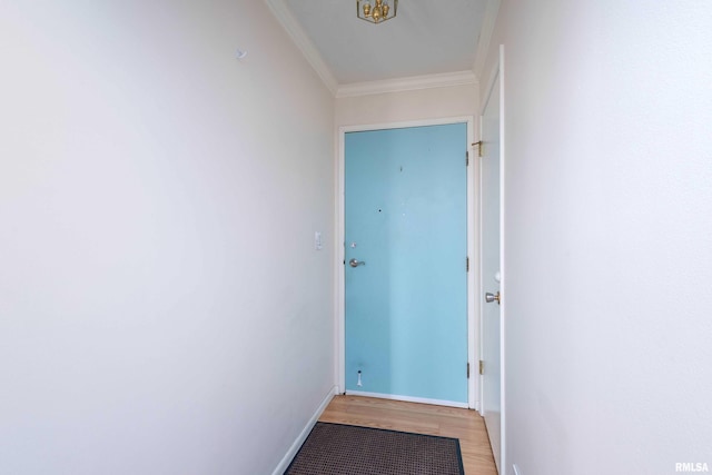 1360 Kimberly Ridge Rd Unit 309, Bettendorf, IA 52722 - doorway to outside with baseboards, ornamental molding, and light wood-style floors