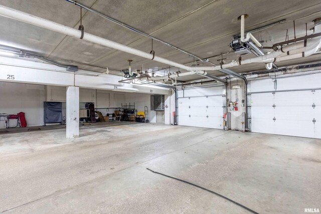 1360 Kimberly Ridge Rd Unit 309, Bettendorf, IA 52722 - garage with a garage door opener