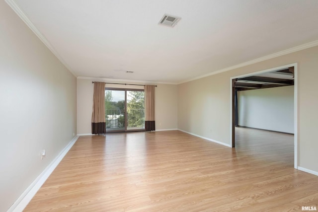1360 Kimberly Ridge Rd Unit 309, Bettendorf, IA 52722 - spare room with baseboards, light wood-style floors, crown molding, and visible vents