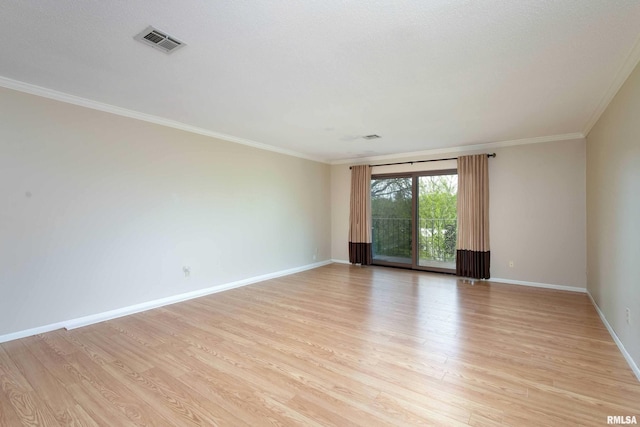 1360 Kimberly Ridge Rd Unit 309, Bettendorf, IA 52722 - empty room with light wood-style floors, visible vents, baseboards, and ornamental molding