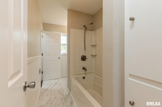 bathroom featuring shower / tub combination and marble finish floor