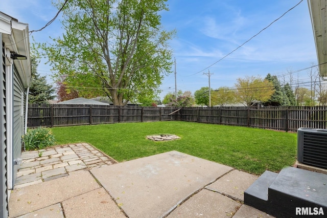 view of yard with cooling unit, a patio, and a fenced backyard