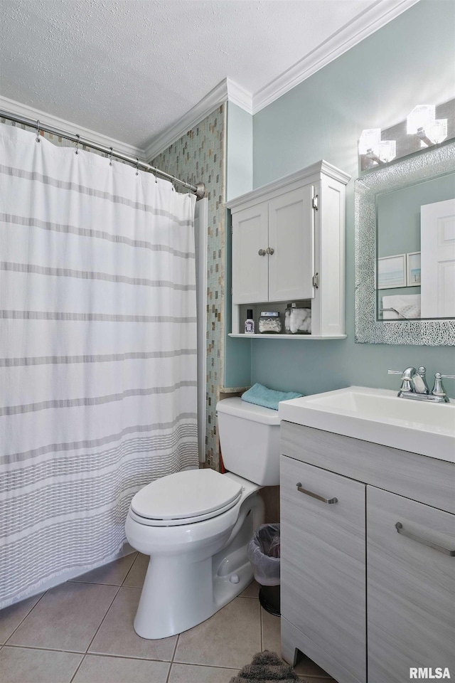 full bath featuring toilet, tile patterned floors, crown molding, a textured ceiling, and vanity