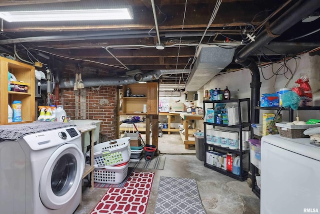 unfinished basement with washer / dryer