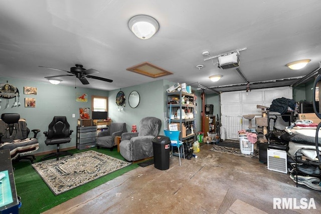 garage with ceiling fan and a garage door opener