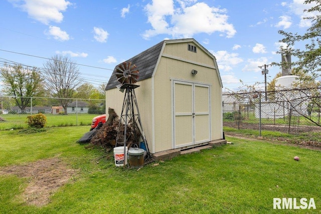 view of shed featuring fence