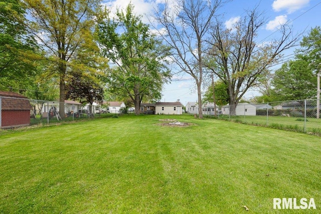 view of yard featuring fence