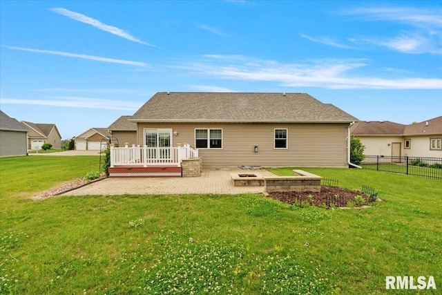 17 Blackstone Way, Le Claire, IA 52753 - back of property with a patio, a deck, and an outdoor fire pit