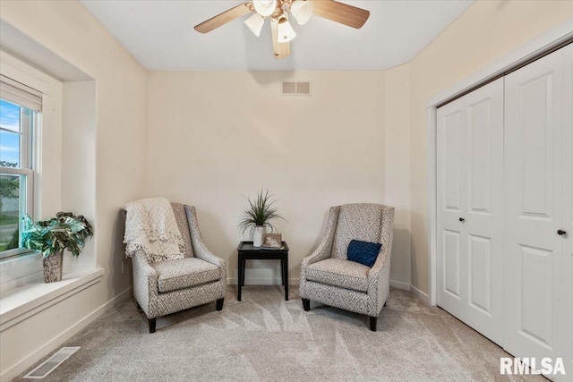 17 Blackstone Way, Le Claire, IA 52753 - sitting room featuring ceiling fan, light colored carpet, and baseboards